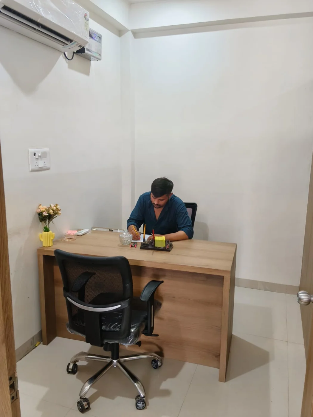 A team member at work in the Ravishwar Solution office